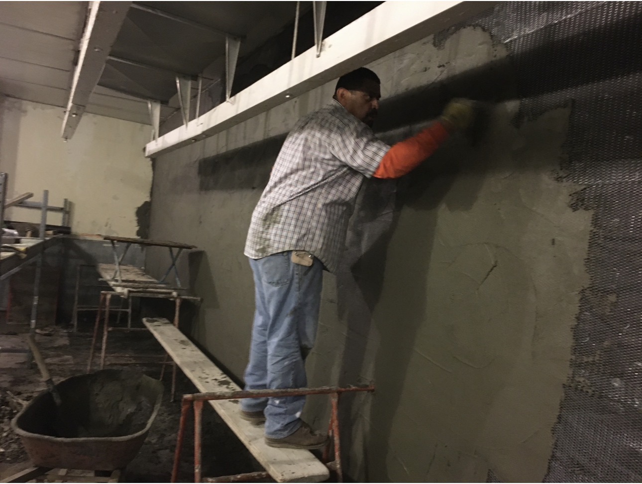 Completed cementitious wall system inside commercial refrigeration unit in Pico Rivera