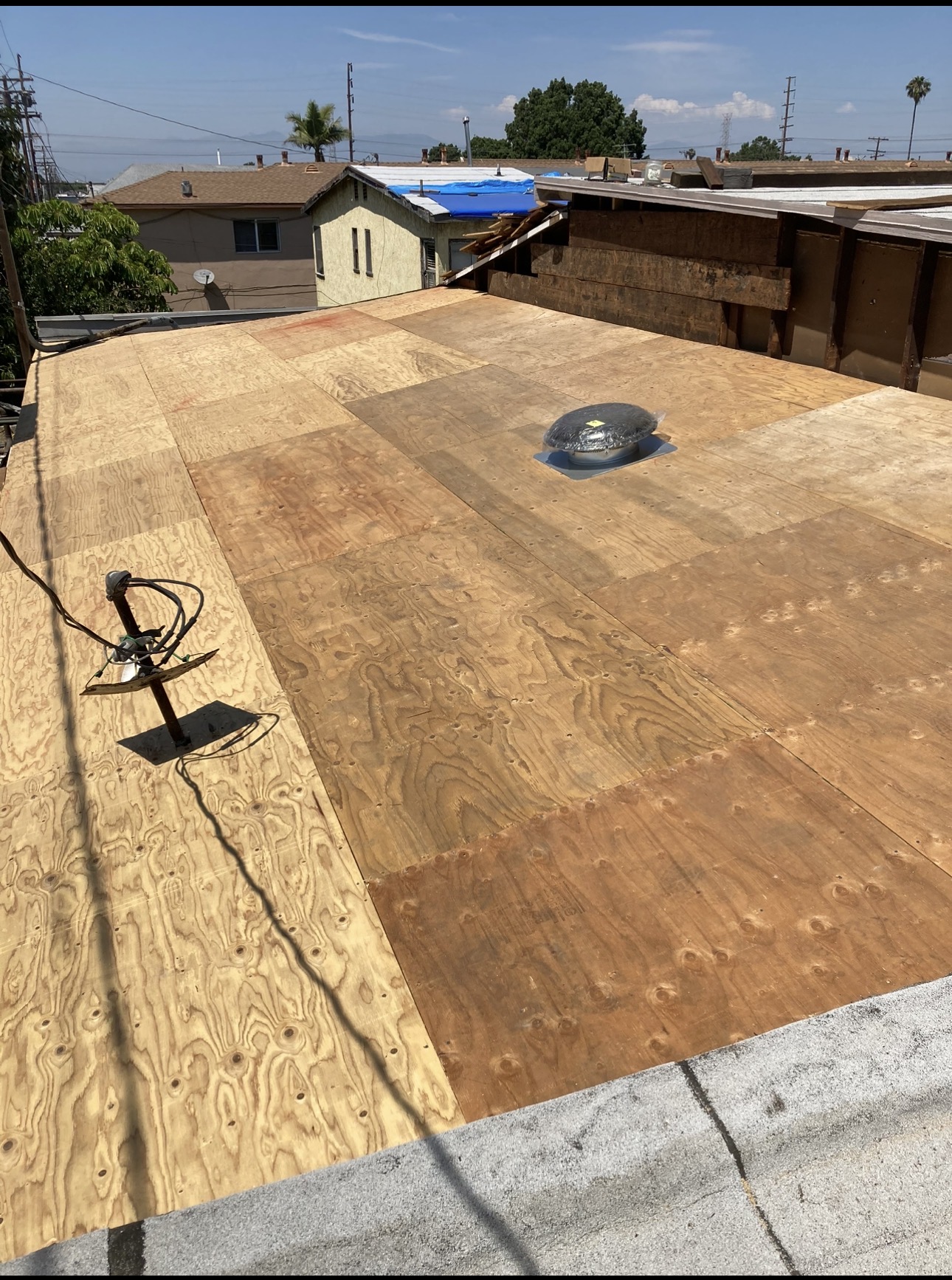 Flat roof framing and sheathing detail during construction