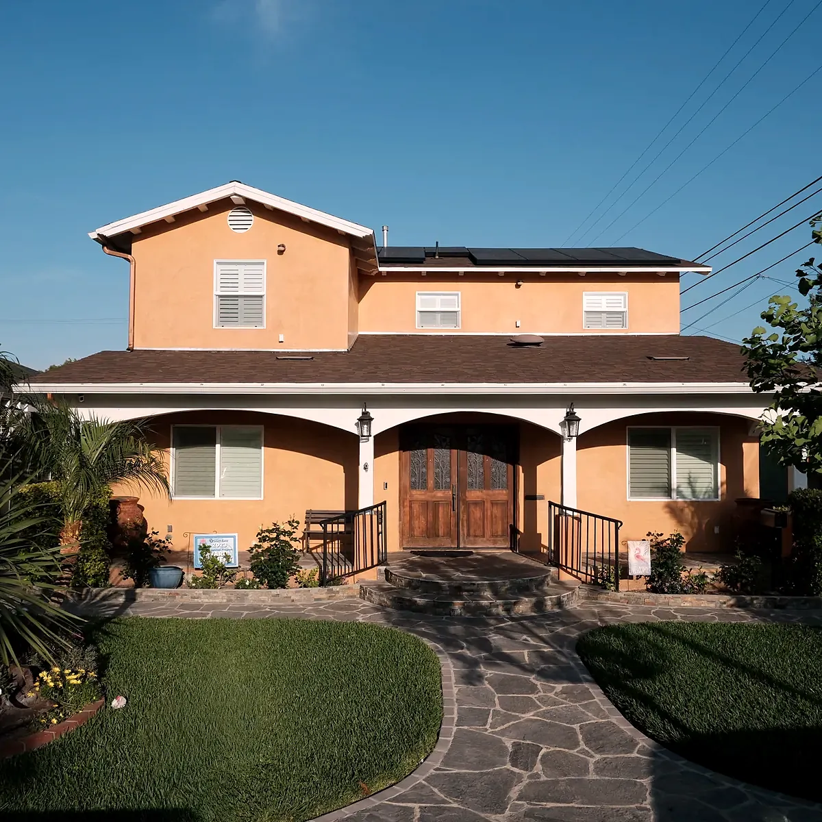 Completed exterior after a second-story addition and whole-house renovation